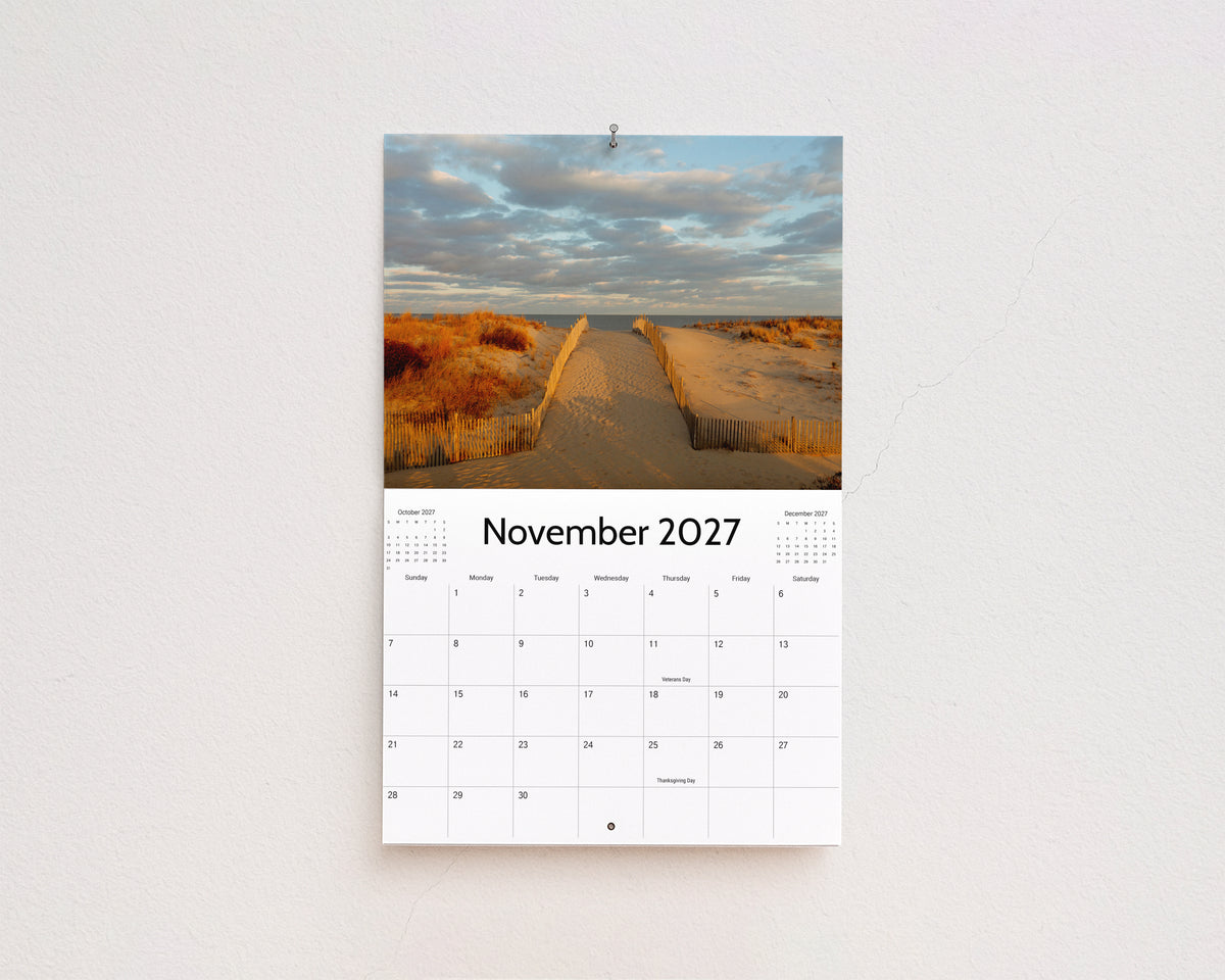 November 2027 page: a sandy path through the dunes leading to the beach